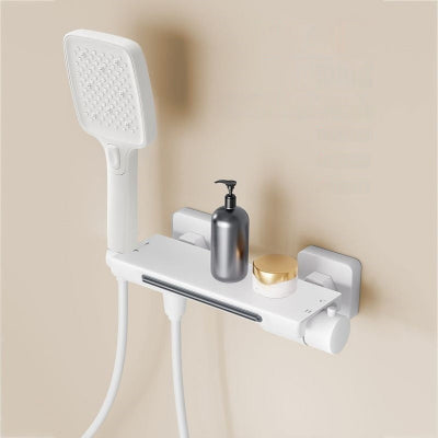 mitigeur baignoire blanc avec effet cascade