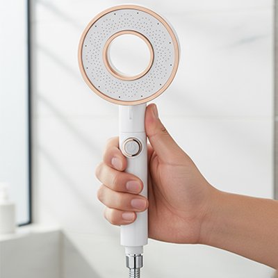 Pommeau de douche avec bouton d'arret