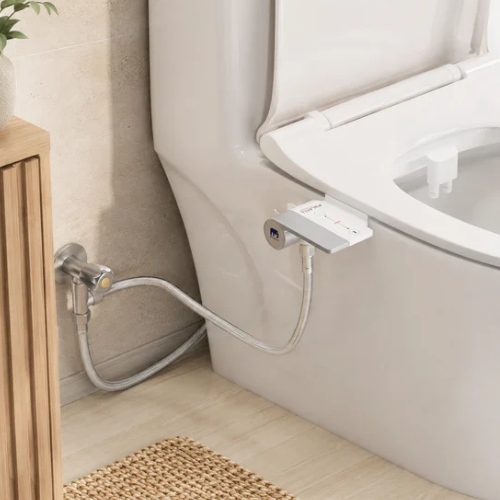 Accessoire d’hygiène WC avec double buse et douchette portable blanche
