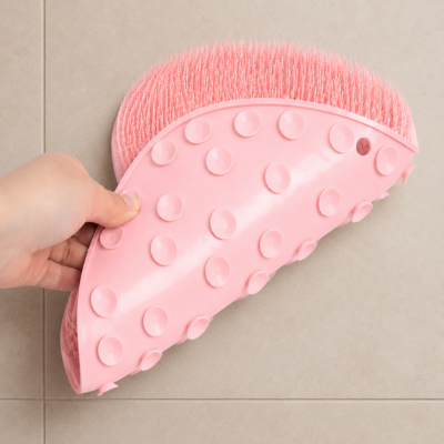 Dessous du tapis lave-pieds rose avec ventouses antidérapantes solides
