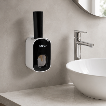 Distributeur automatique de dentifrice noir près d’un lavabo moderne