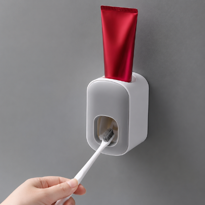 Distributeur de dentifrice blanc mural avec tube rouge