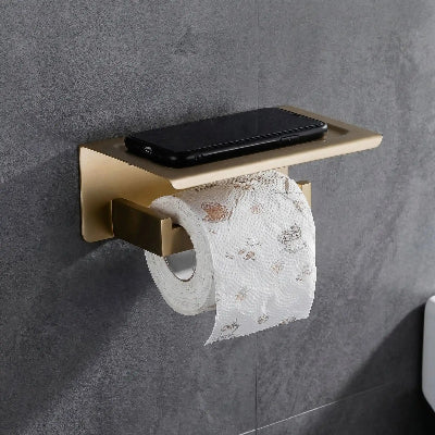 Porte papier hygiénique dore avec petite tablette