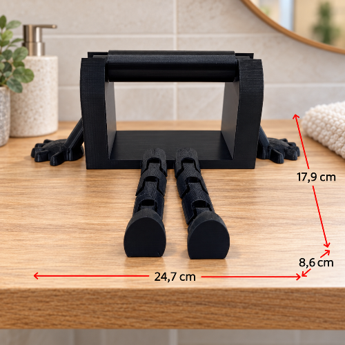 Porte-papier toilette noir sans rouleau sur une tablette en bois