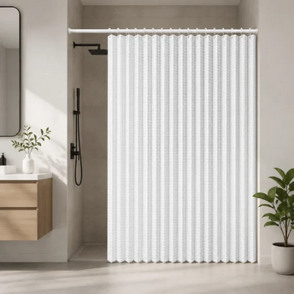 Rideau de douche accordéon blanc installé sur une tringle extensible