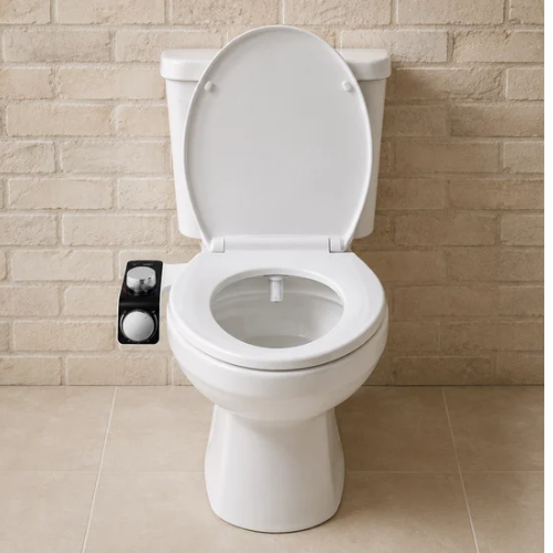 Vue de face d’une toilette avec bidet double buse