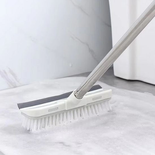 Balai brosse de nettoyage utilisé sur un carrelage moderne