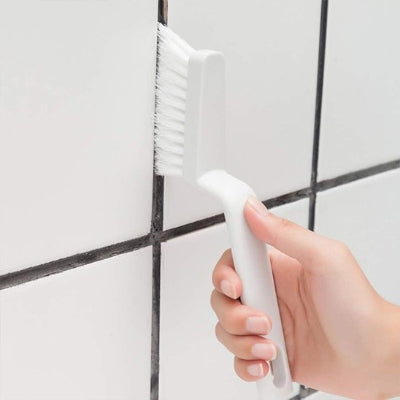 Brosse de nettoyage pour joints de carrelage avec manche ergonomique