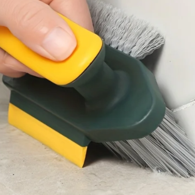 Brosse double tête pour éliminer les saletés dans les coins 