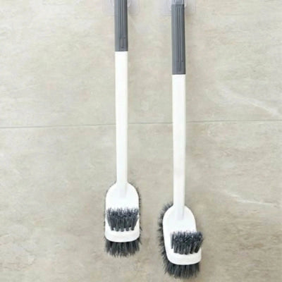 brosse wc de couleur gris et blanc