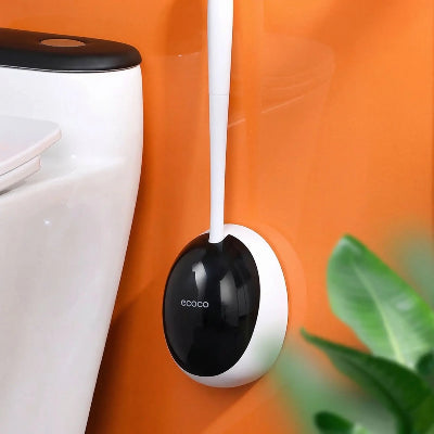 brosse wc en silicone sur mur orange