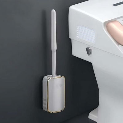 Brosse WC avec une conception permettant l'évacuation de l'eau 