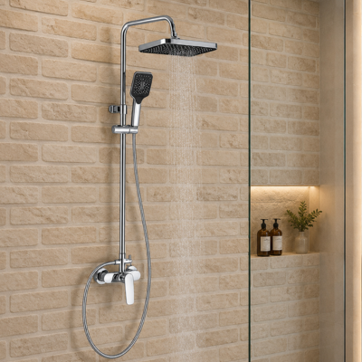 colonne-de-douche-sur un mur de brique beige