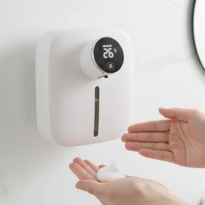 Distributeur automatique de savon avec fenêtre de contrôle du niveau