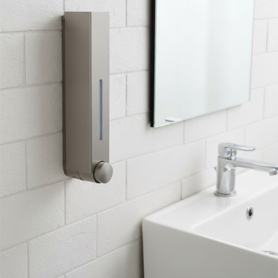 Distributeur de savon mural​ avec système d'ouverture facilitant le remplissage