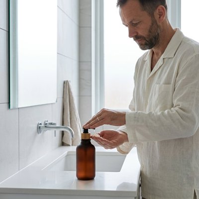 Distributeur de savon pompe doseuse en verre de couleur marron