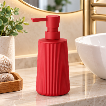 Distributeur de savon rouge en résine au design moderne et épuré