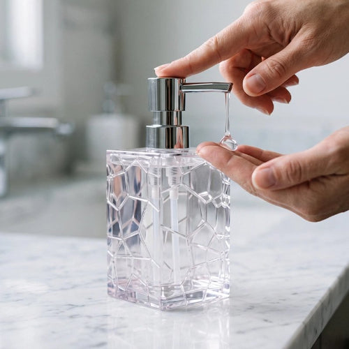 Distributeur de savon transparent texturé avec pompe chromée