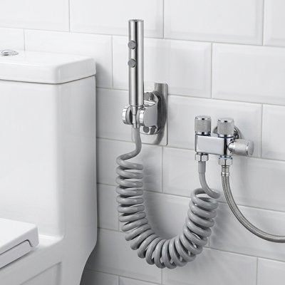 Douchette toilette avec flexible s'étirant et se rétractant automatiquement