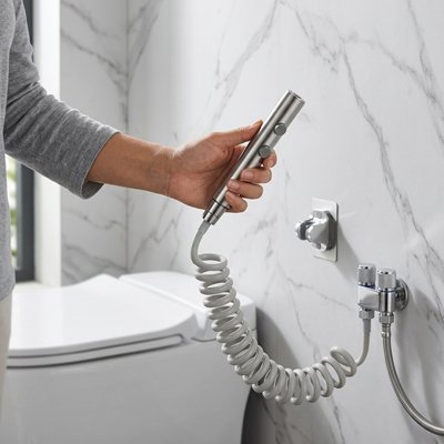Douchette toilette avec modes de pulvérisation contrôlables via les boutons 