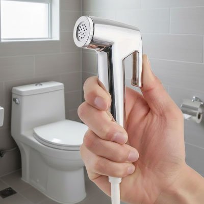 Douchette WC avec tuyau spiralé rétractable 