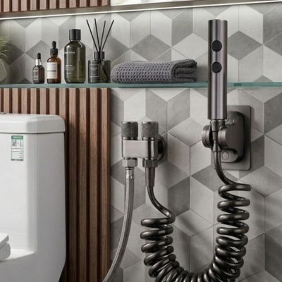 Douchette WC  tuyau retractable en spirale offrant une grande flexibilite
