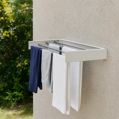 Étendoir à linge mural pliable blanc pour salle de bain