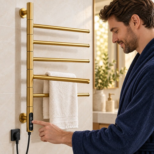 Homme utilisant la commande d’un sèche-serviettes électrique doré mural