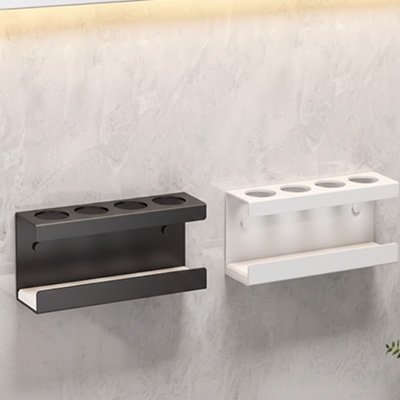 Porte brosse à dent mural disponible en noir et blanc