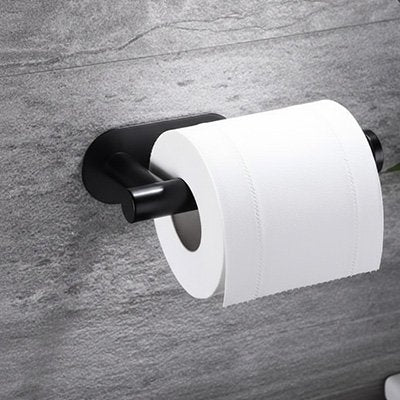 Porte papier toilette compatible avec différents types de surfaces