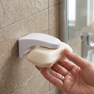 Porte savon aimante reste maintenu par attraction magnétique