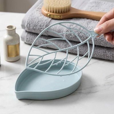 Porte-savon compact avec grille amovible facilitant le séchage