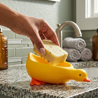 Porte savon en forme décorative de canard jaune ou blanc