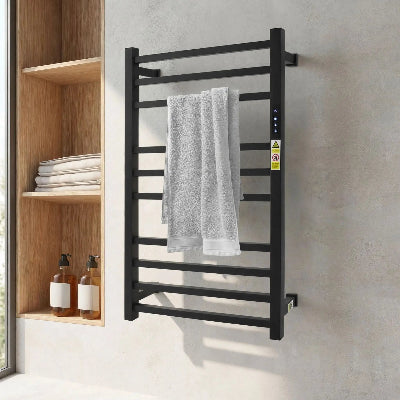 porte serviettes électrique noir sur mur gris