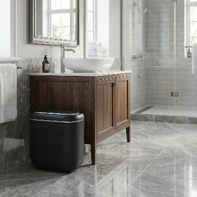 poubelle-salle-de-bain-noir-de-forme-ovale