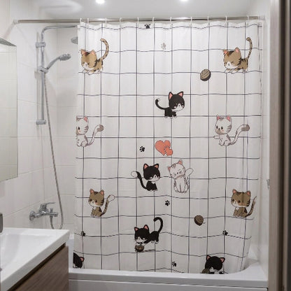 Rideau de douche à motifs de chats suspendu devant une baignoire