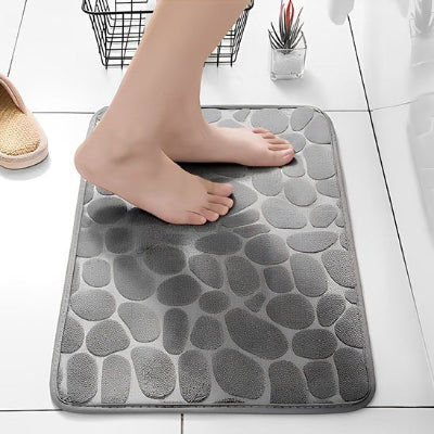 tapis de bain au design texturé inspiré de pierres naturelles