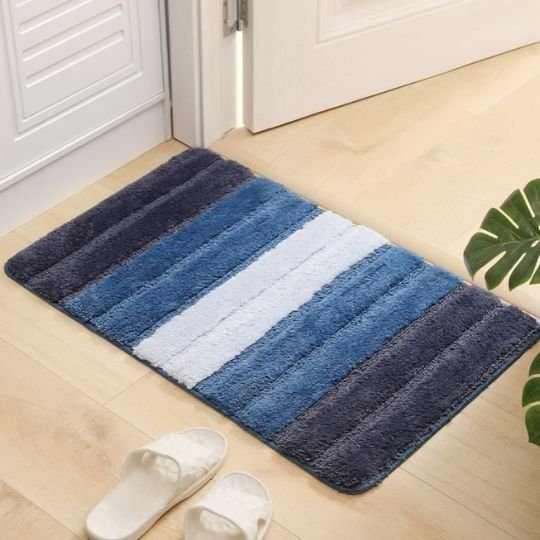 tapis de bain avec dégradé de couleur bleu