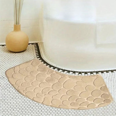 Tapis de douche beige en forme semi-circurlaire